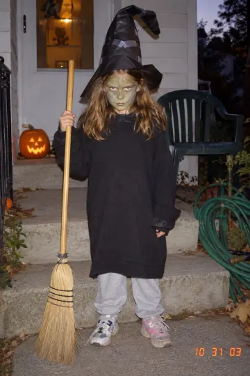 The real childhood photo: a hoodie, sweatpants and green face paint